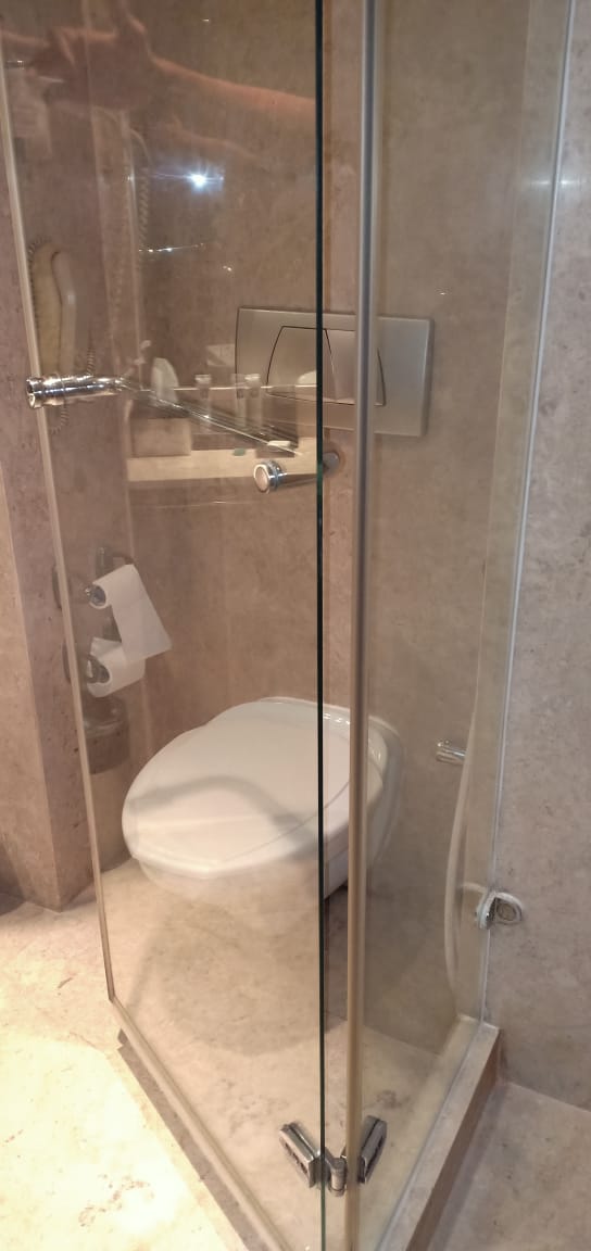 Glass shower cubicle after cleaning